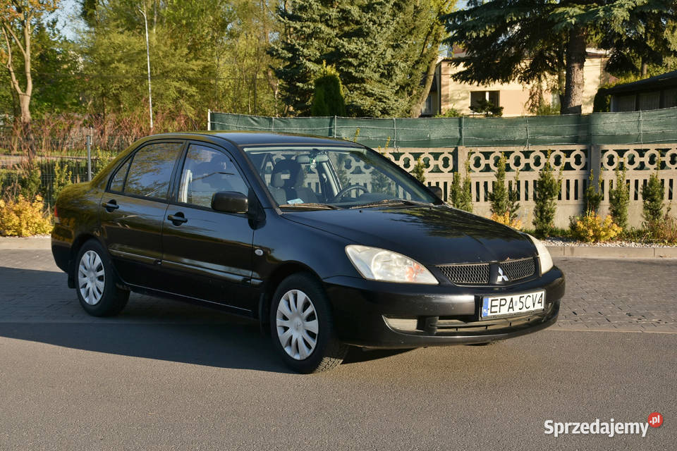 Mitsubishi Lancer 16 LPG długie opłaty welurowa tapicerka łódzkie sprzedam