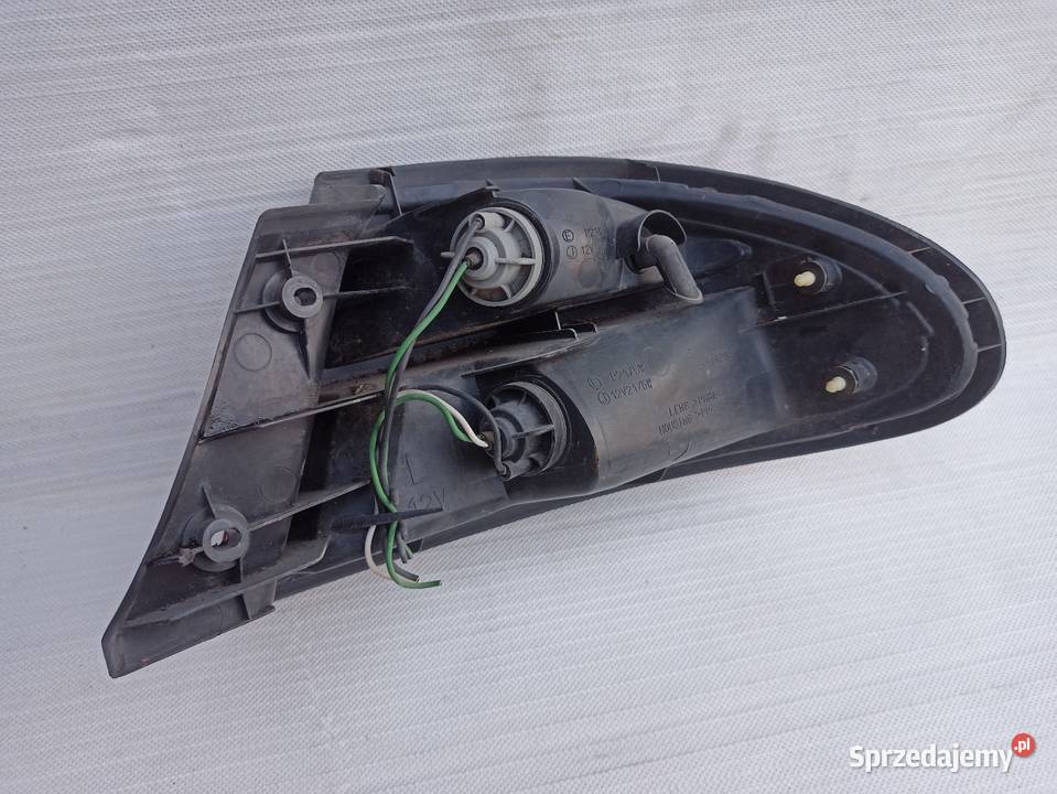 Mazda 323F BA lampa tył tylna lewa narożna w Lampy tylne Sieradz