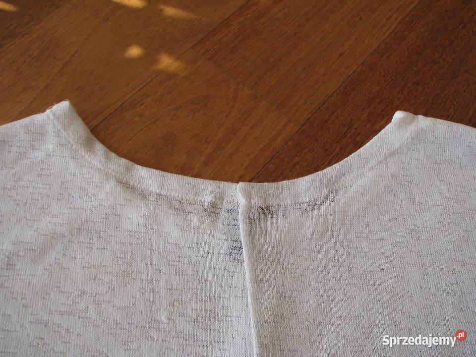 Luźny biały sweterek bluzka z cekinkami L XL Brzegi