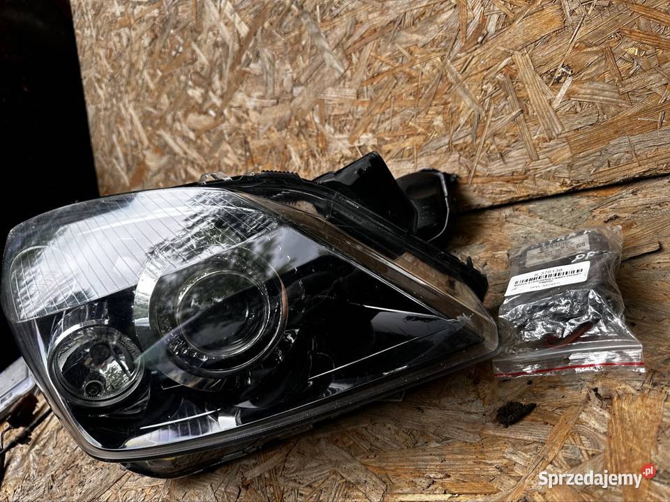Opel astra h 3 lampa przednia prawa bixenon prawe Lampy przednie Tywonia