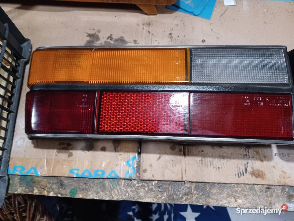 Audi 100 C2 lampy tylne lewą prawa komplet HELLA osobowe sprzedam