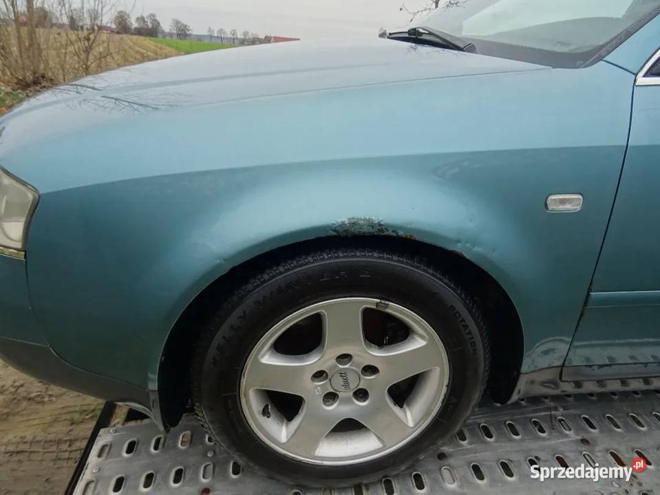 Błotnik lewy przedni do Audi A6 C5 kolor LX6V osobowe Błotniki Parcice