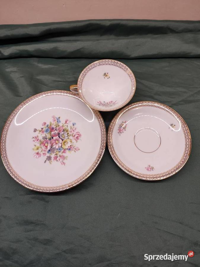 Filiżanka ze spodkiem i talerzykiem porcelana