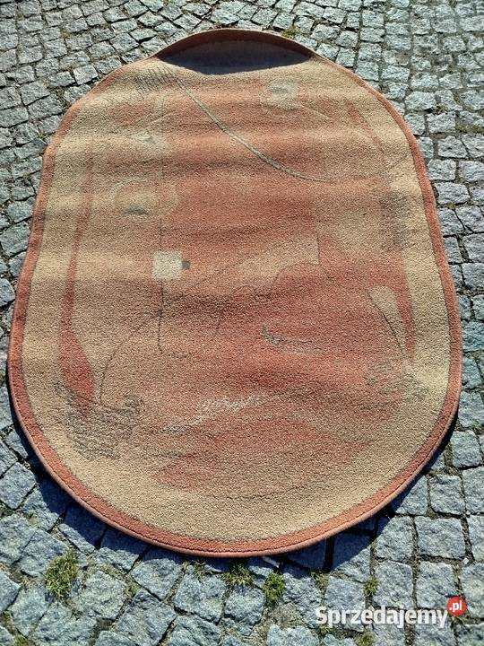 Dywan owalny 170x120 brązowoczerwony z wzorami Kraków