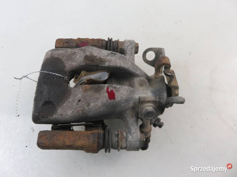 ZACISK PRAWY TYŁ OPEL ASTRA III H