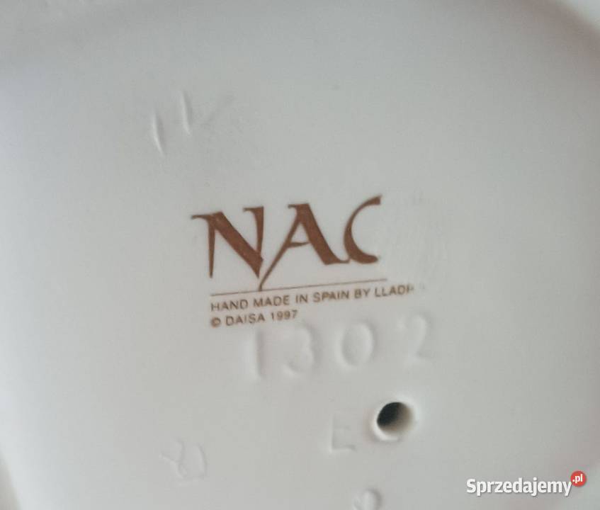 Porcelanowa dziewczynka z książką Olsztyn