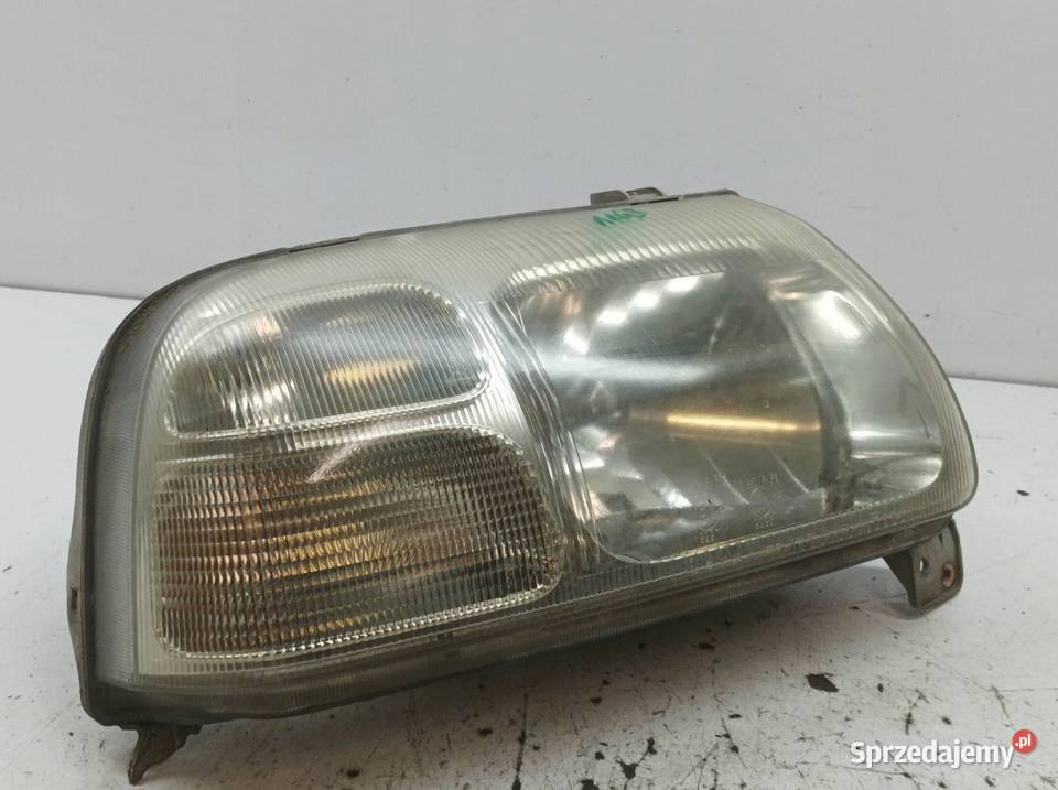 LAMPA PRZÓD PRAWA EU 10032080 Suzuki Grand Lampy przednie