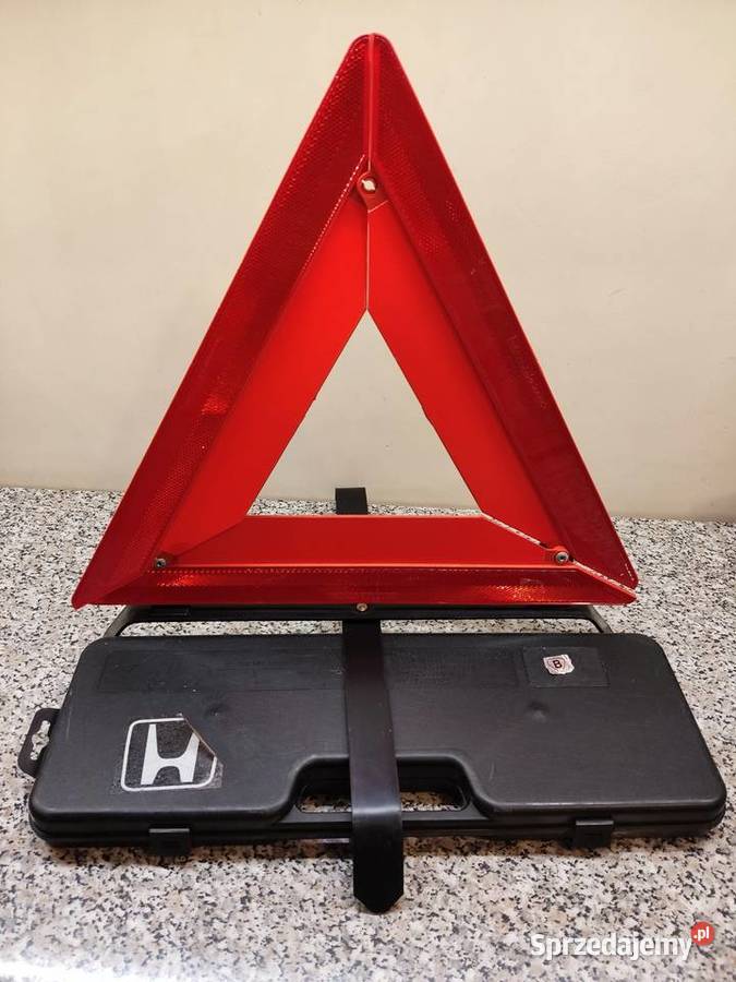 Trójkąt ostrzegawczy Honda z czarną walizką Głuchołazy