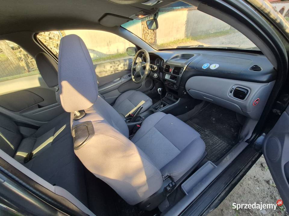 Nissan Almera N16 2003 15 benzyna Kokotów