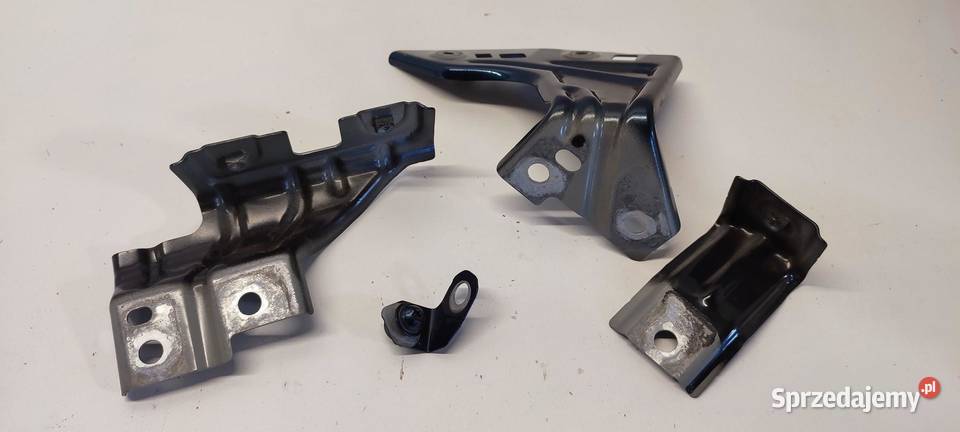 VW TAYRON MOCOWANIE BŁOTNIKA LEWE KOMPLET