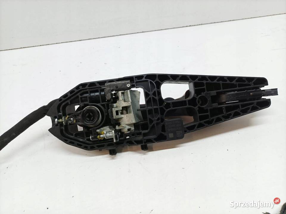 KLAMKA ZEWNĘTRZNA LEWA TYŁ KF 0104139501 Ford