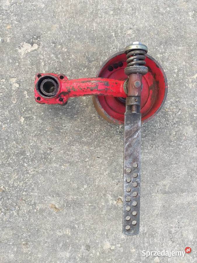 Napinacz pasa młocarni MF