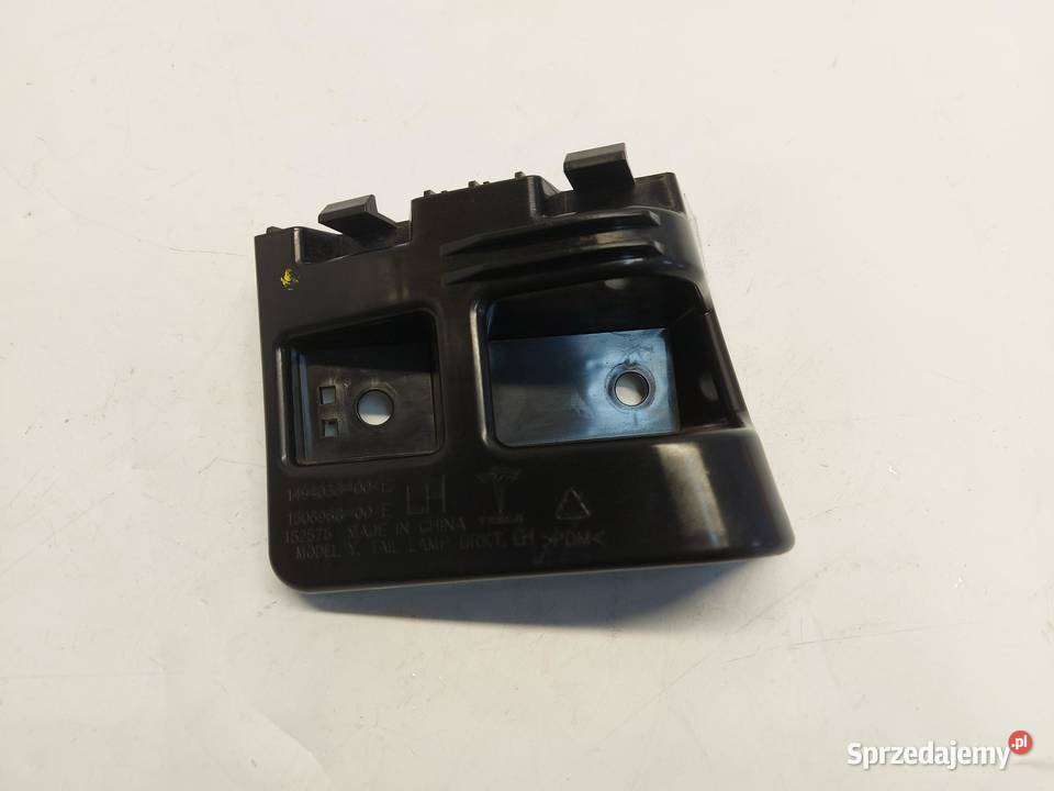 TESLA MODEL Y 2024r ŚLIZG WSPORNIK LAMPY LEWY sprzedam