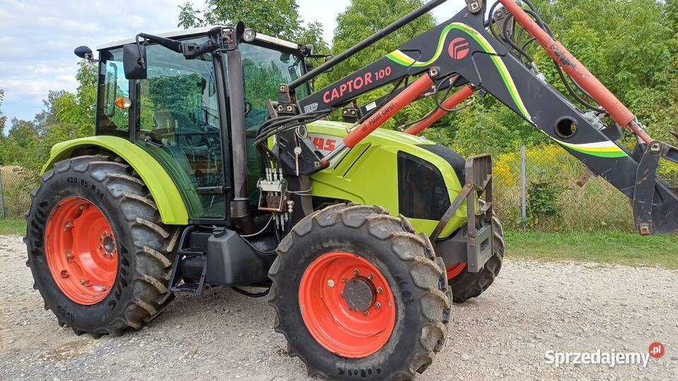 Claas Axos 320 z ładowaczem czołowym Faucheux Siedlce