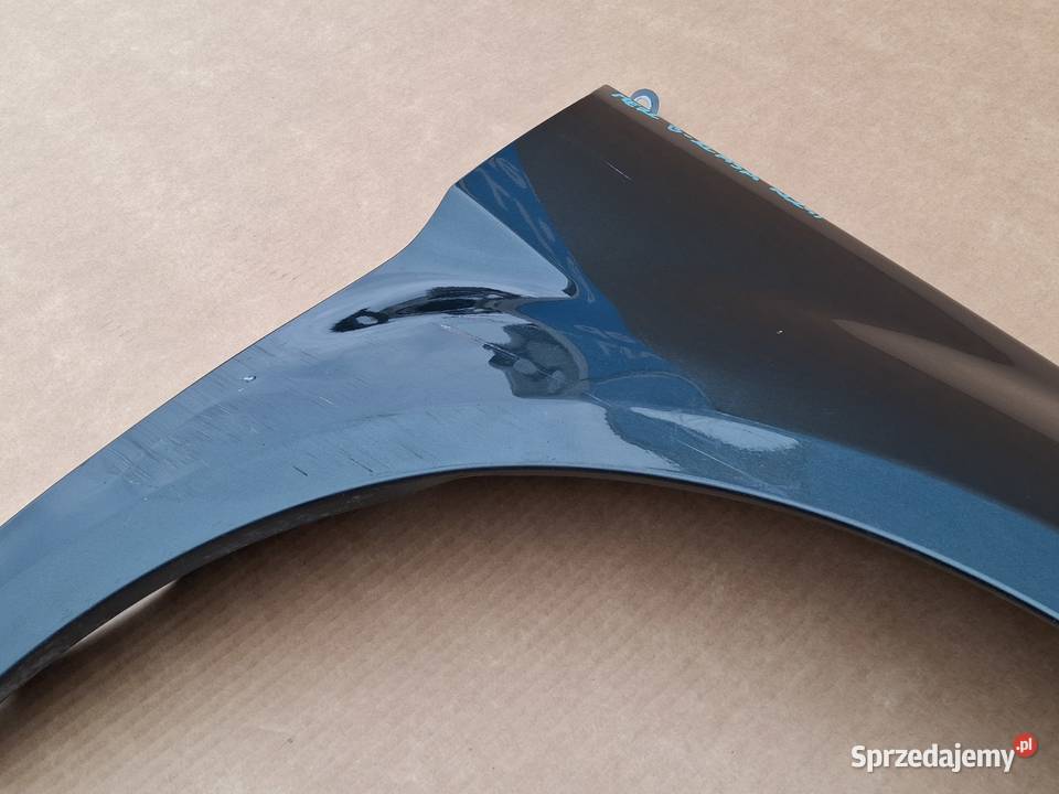 MERCEDES BKLASA W245 BŁOTNIK PRAWY PRZÓD Bieleń