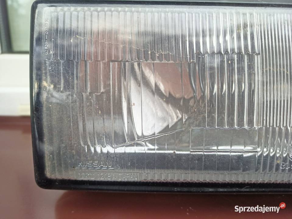 Nissan Sunny N13 lampa przednia prawa reflektor Sieradz