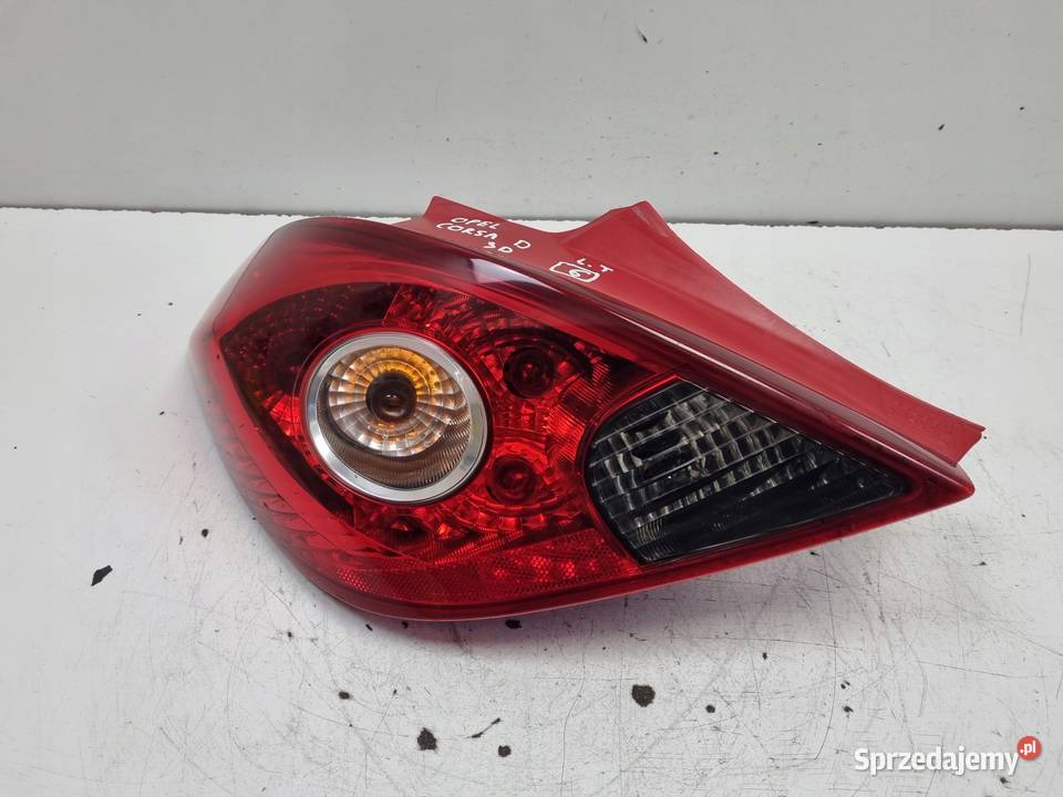 LAMPA TYLNIA LEWA Opel Corsa D 3D HTB 0614r LEWY Rudka