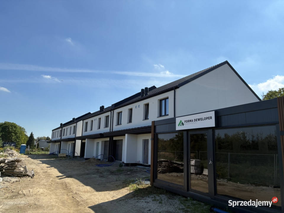 Przestronny segment z ogródkiem i garażem w Ożarów Mazowiecki