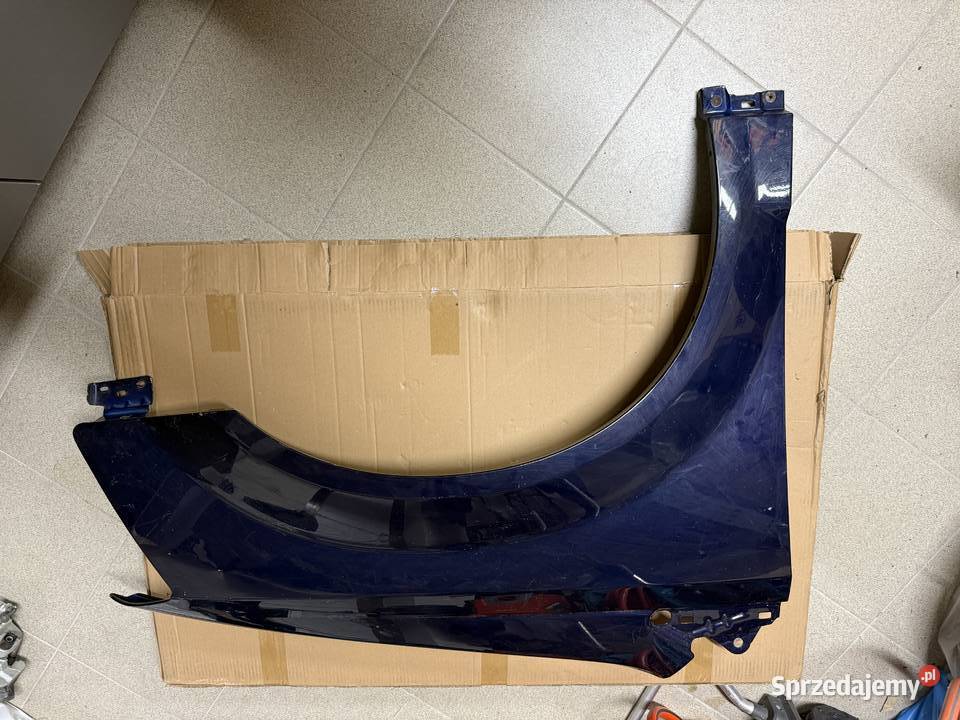 Błotnik prawy przód Dodge Grand Caravan oryginał osobowe Kolbuszowa Dolna