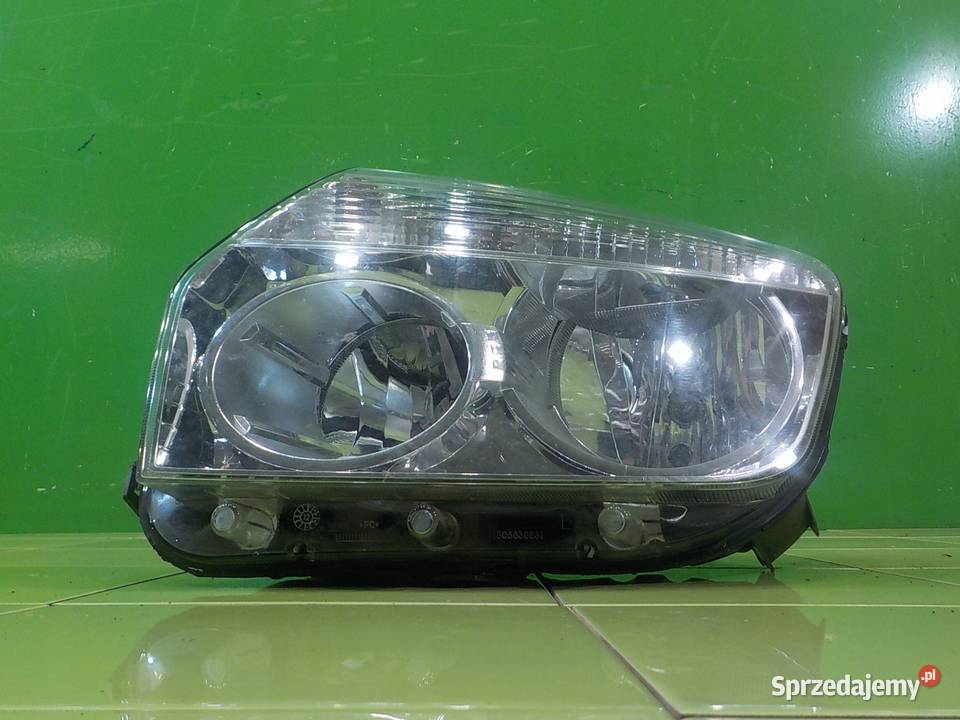 DACIA DUSTER I 09r 5D lampa lewa przod Suków