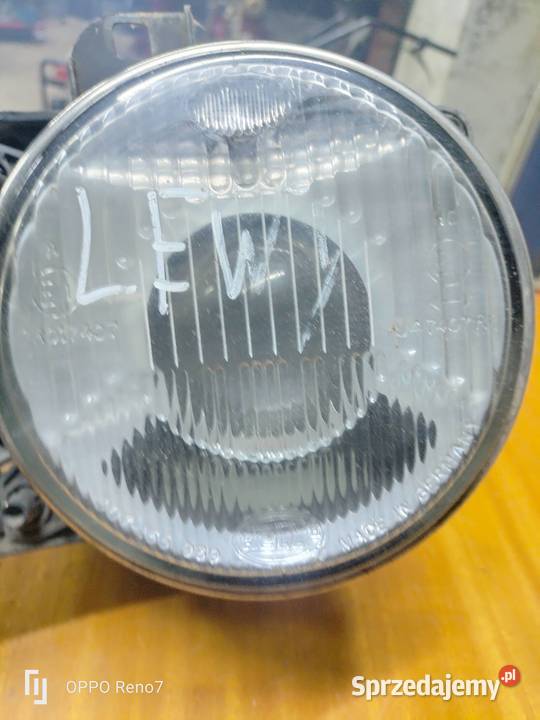 Lampa lewa BMW E34 Hella osobowe Łubno