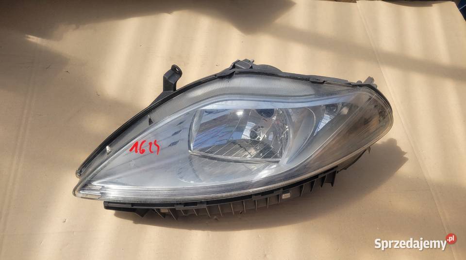 LANCIA YPSILON III 11 REFLEKTOR LEWY LAMPA PRZÓD