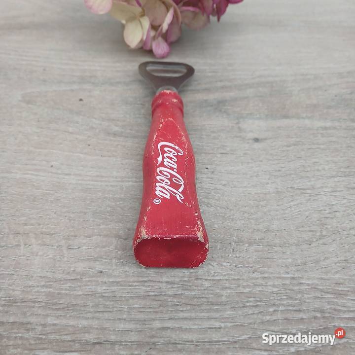 Stary drewniany otwieracz do butelek CocaCola