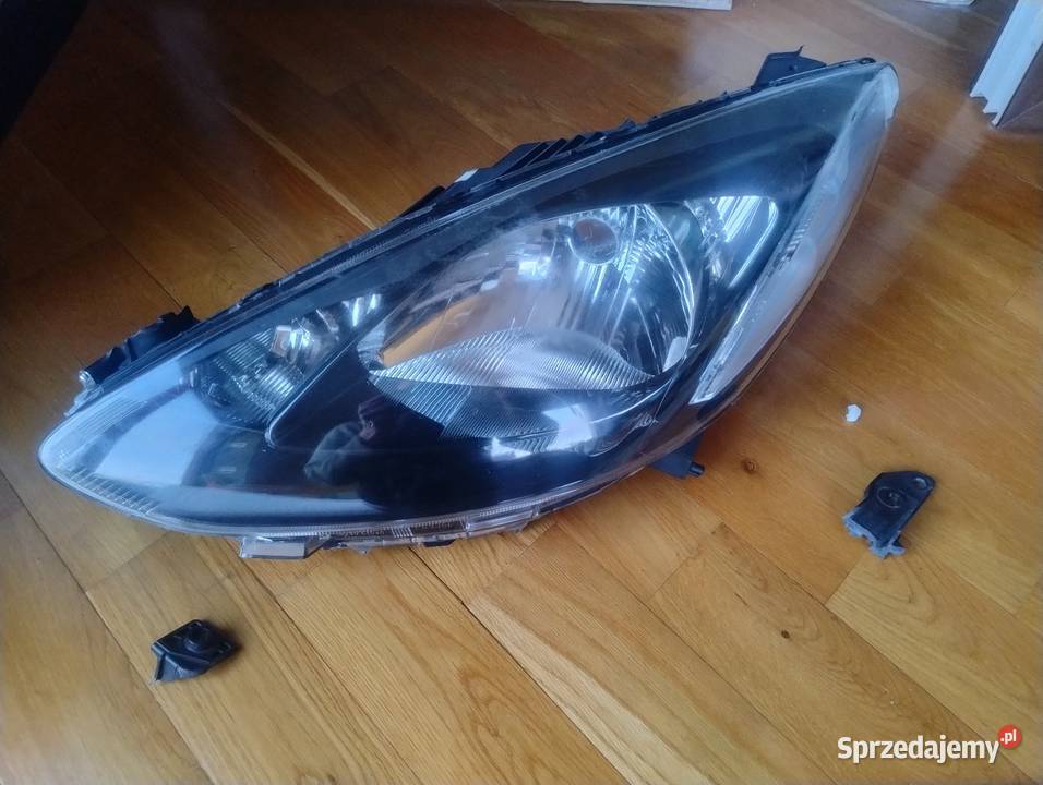 Mazda 2 0714 lampa reflektor lewa przednia przód osobowe Lampy przednie wielkopolskie Ślesin