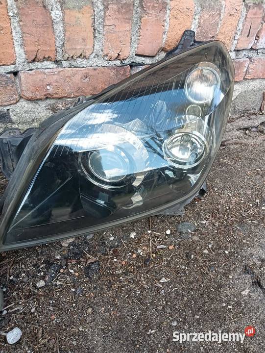 Lampy Astra H GTC xenon skrętny kompletne Lampy przednie Poniec