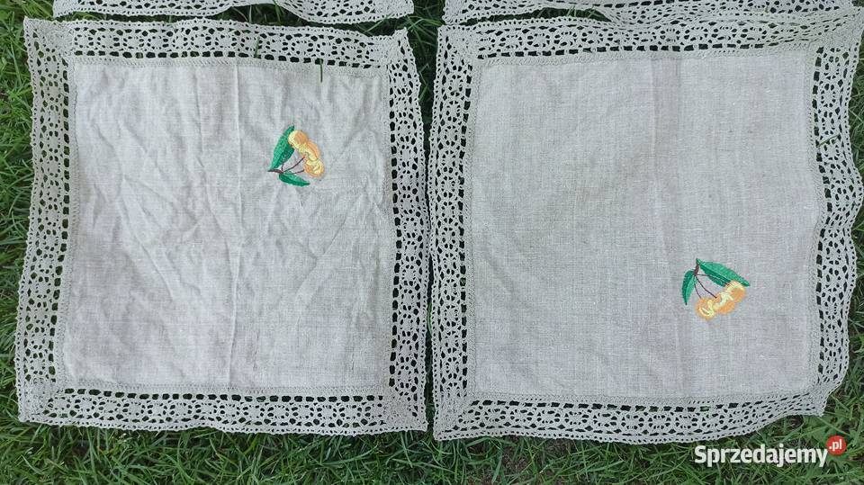 Ozdobne lniane haftowane obrusy z serwetkami
