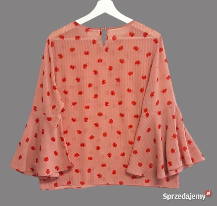 Damska bluzka różowa z falistym wykończeniem Chrzanów