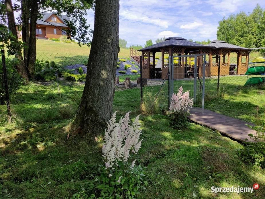 Dom całoroczny z prywatną linią brzegową jeziora Długie