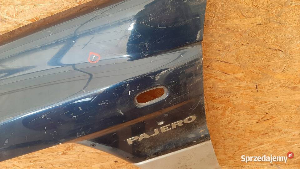 MITSUBISHI PAJERO III 99 BŁOTNIK LEWY PRZÓD Nowy Tomyśl