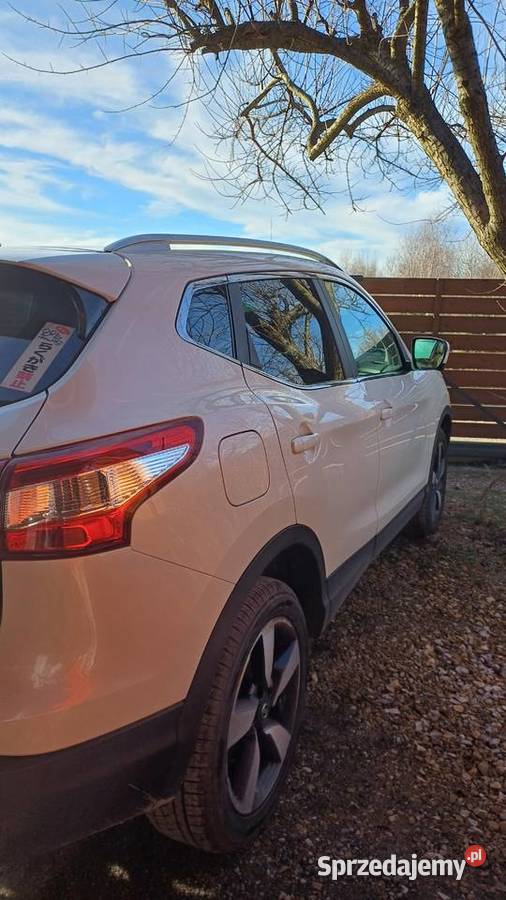Perłowy Nissan Qashqai że szklanym dachem ABS Kraków