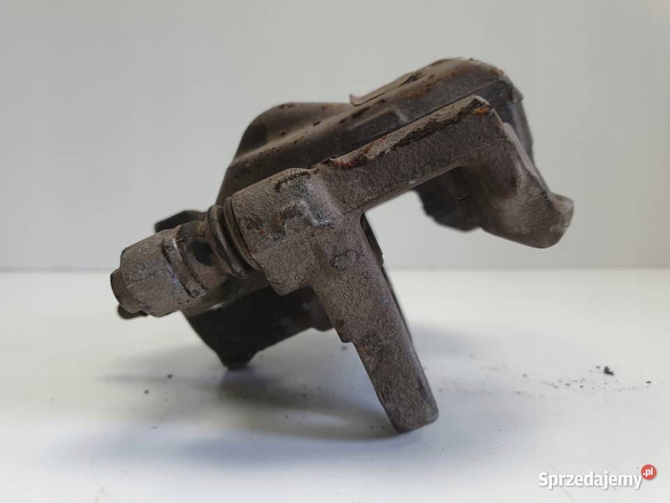 Toyota Corolla XII E21 PRZEDNI ZACISK HAMULCOWY Rudka
