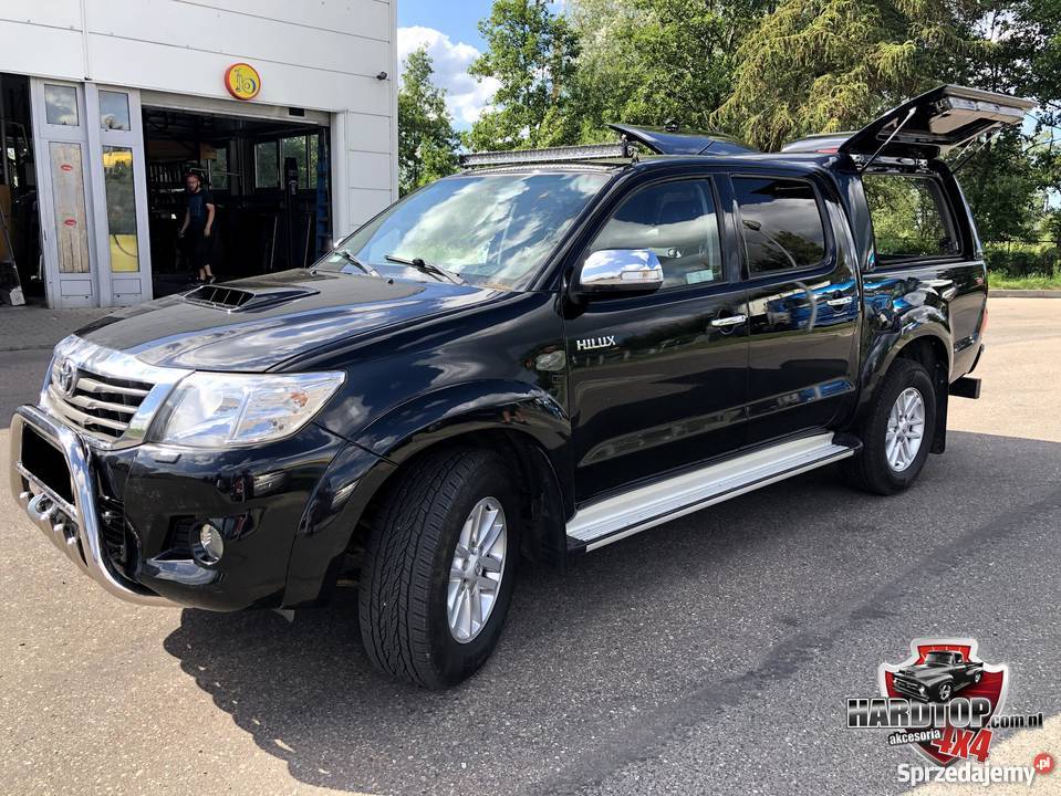 Zabudowa Toyota Hilux 0515 otwierane klapy z Pasłęk