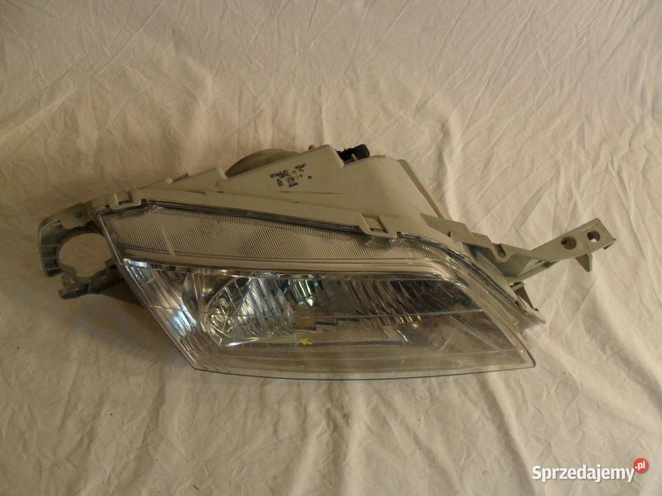 Reflektor Przód strona lewa Mitsubishi Pajero Nowy Tomyśl