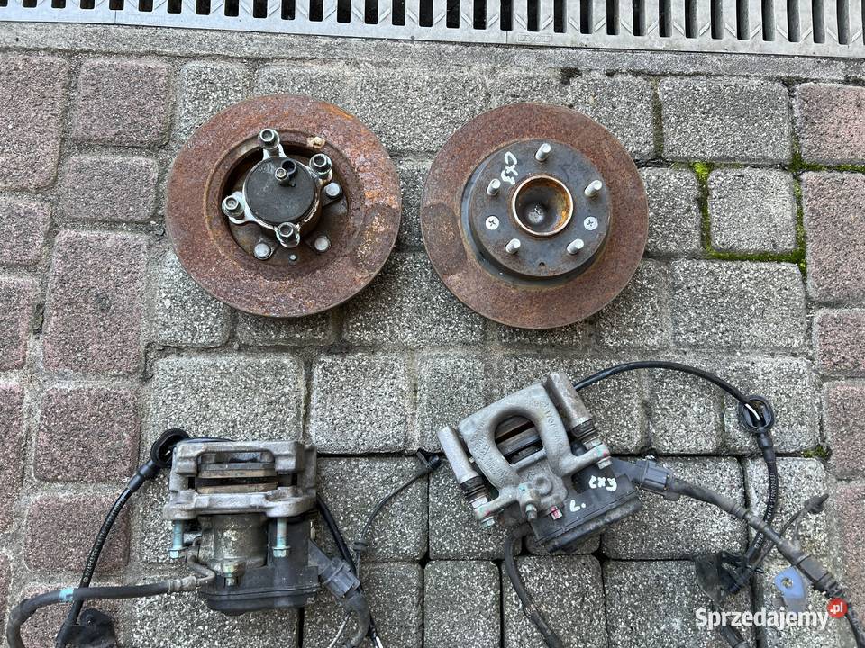 Mazda CX3 Zacisk Elektryczny tarczy tył prawy Tarnów