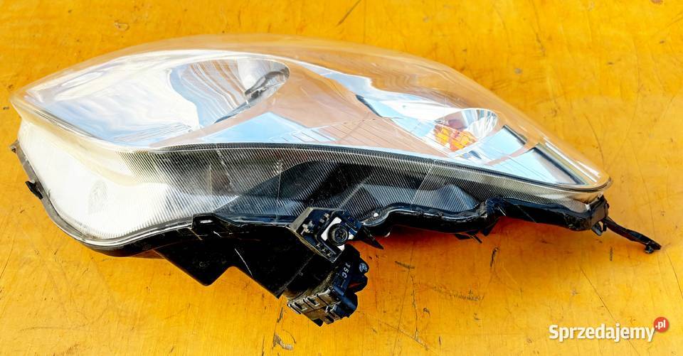 NISSAN PIXO LAMPA LEWA ORYGINAŁ osobowe