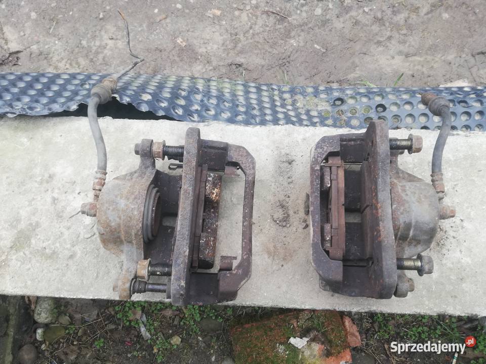 Zacisk przód prawy lewy Kia carens ii 2 osobowe Zaciski i jarzma Stary Sącz
