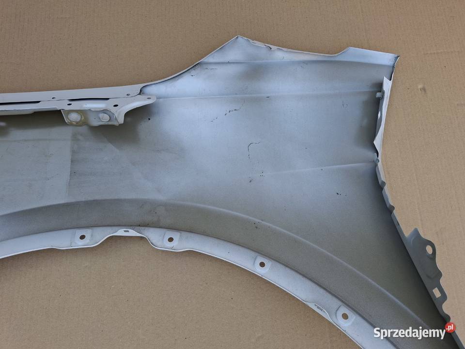 VW ID4 ID4 BŁOTNIK PRAWY PRZÓD 11A821106 Bieleń
