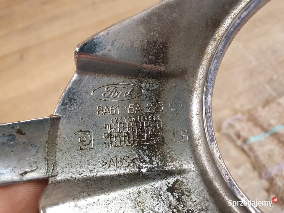 FORD FIESTA MK7 RAMKA HALOGENU LEWA 8A6115A223C Międzychód