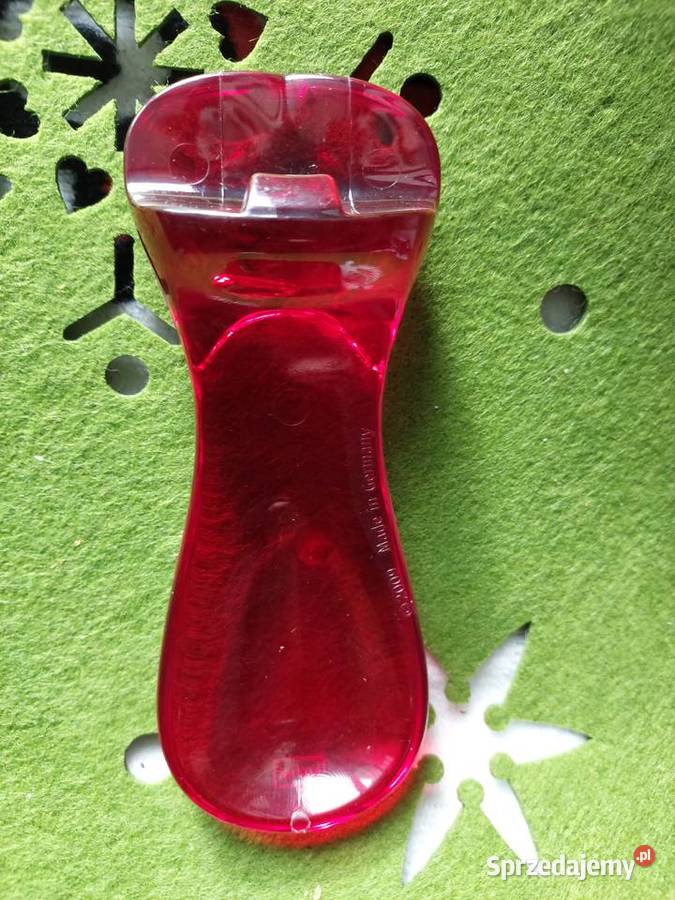 Otwieracz czerwony tworzywo niemiecki 2009r Wrocław