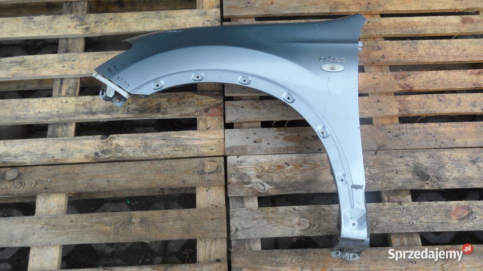 NISSAN QASHQAI I J10 LIFT 10r błotnik lewy przód Błotniki