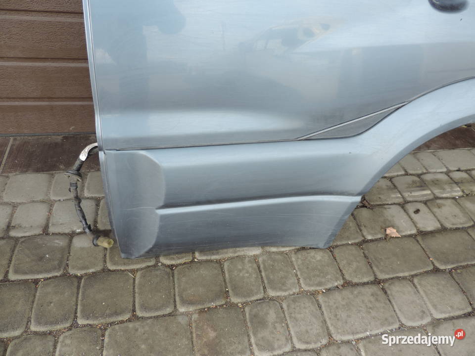 SUZUKI GRAND VITARA 1 5D DRZWI LEWY TYŁ ZY4C13 Nowy Sącz