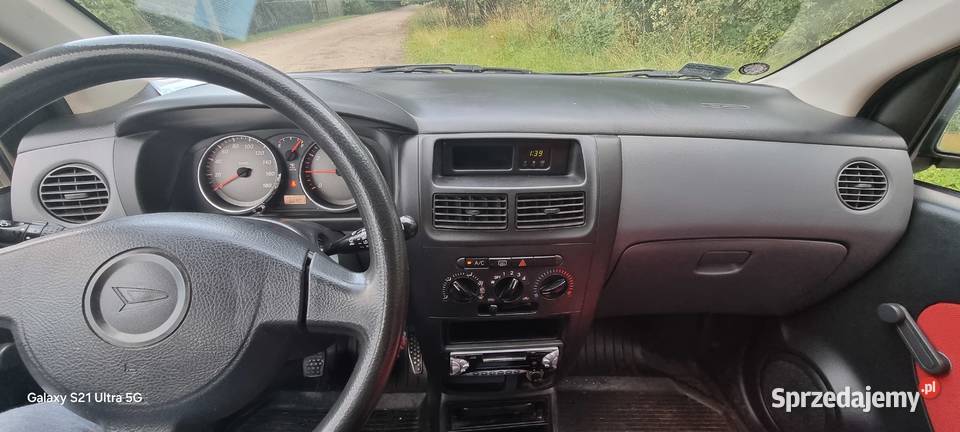 DAIHATSU Cuore 2006 10 Benz Klima przebieg 56
