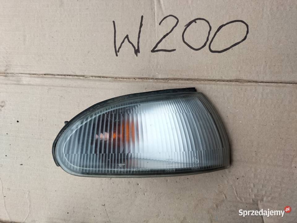 KIERUNKOWSKAZ PRAWY Mitsubishi Lancer 0455785R Prawe Oświetlenie Kamień-Kolonia