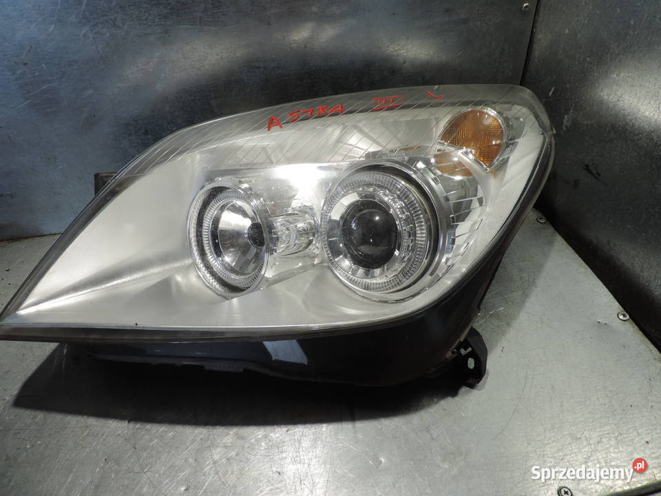 OPEL ASTRA H III FL LAMPA LEWY PRZÓD