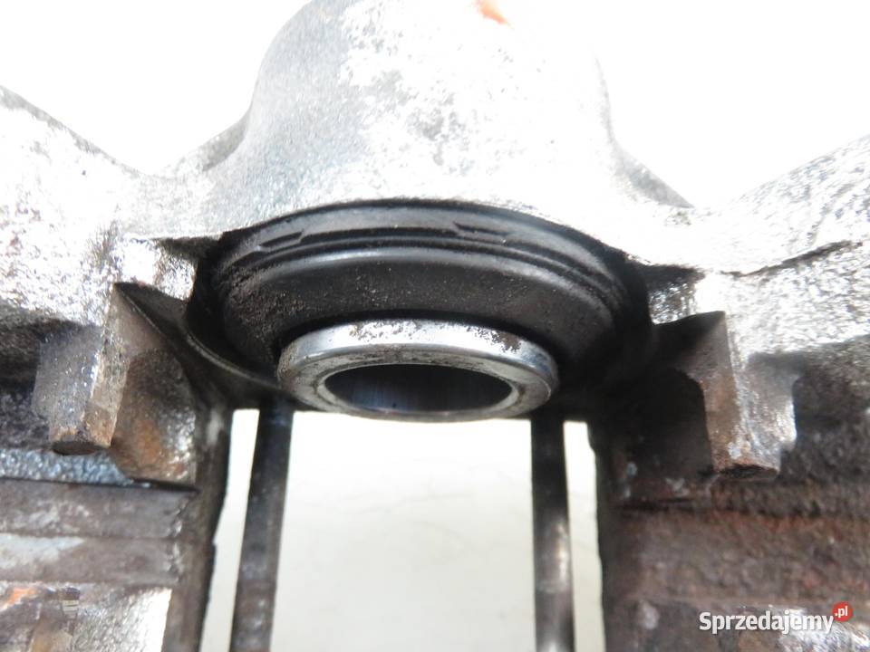 ZACISK LEWY TYŁ VOLVO V70 I 24