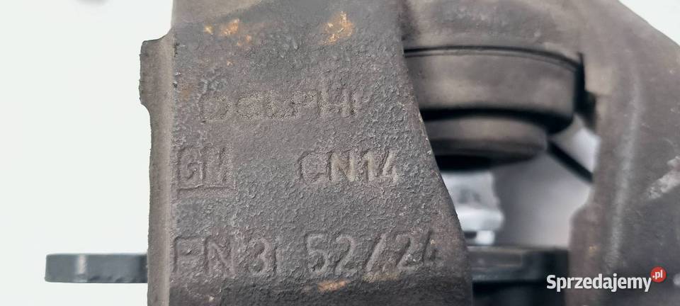 ZACISK HAMULCOWY PRZÓD PRAWY OPEL ASTRA G Pozostałe Lipno